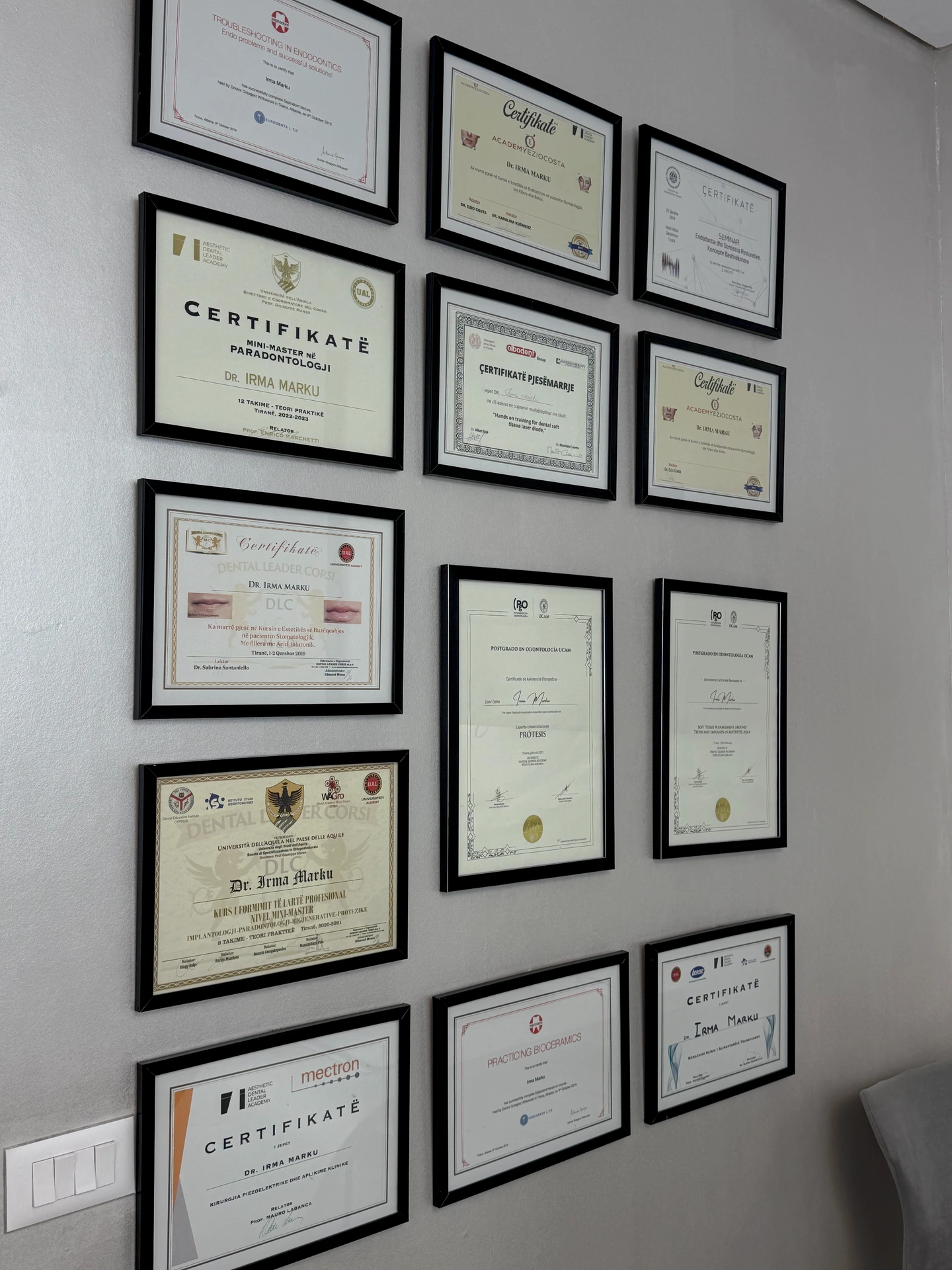 Dr Irma Marku's training certificates at Dental Oasis Tirana